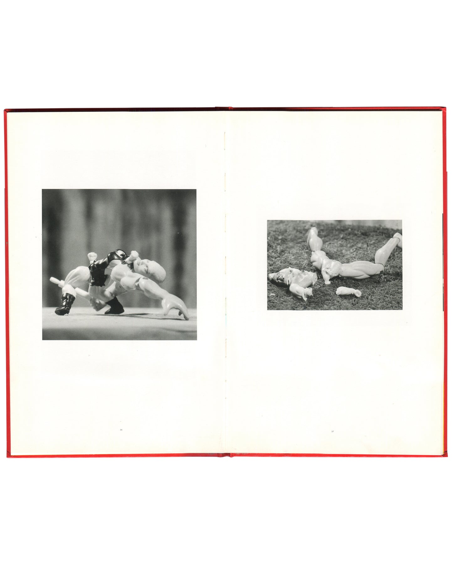 Cindy Sherman, Hasselblad Award 1999, interior spread: two b&w doll works — tangled plastic figures on table; dismembered doll parts scattered on grass
