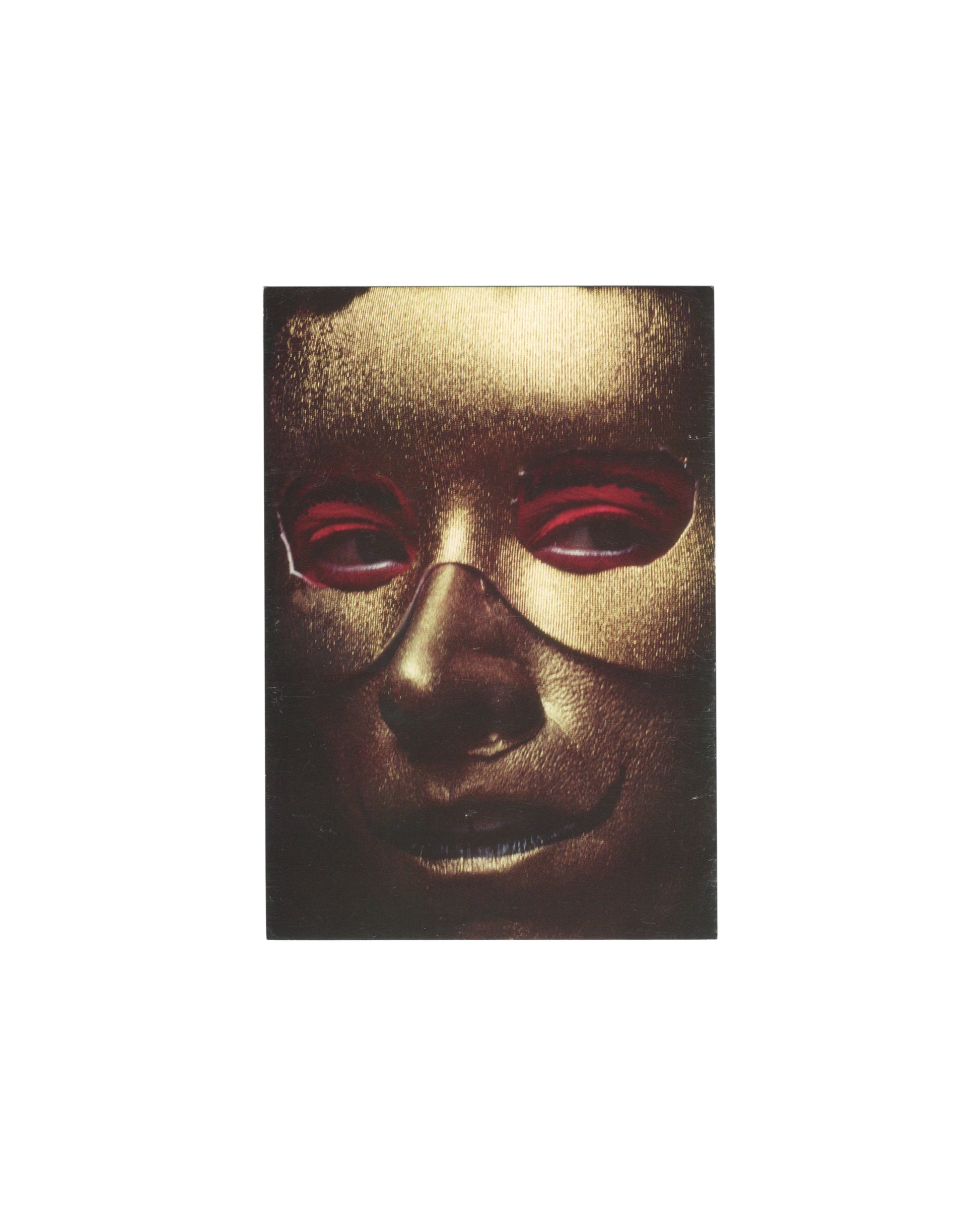 Official 1998 Cindy Sherman museum postcard reproducing *Untitled #317* (1995), showing a close-up gold mask-like face with dark eyes and red cosmetic details.