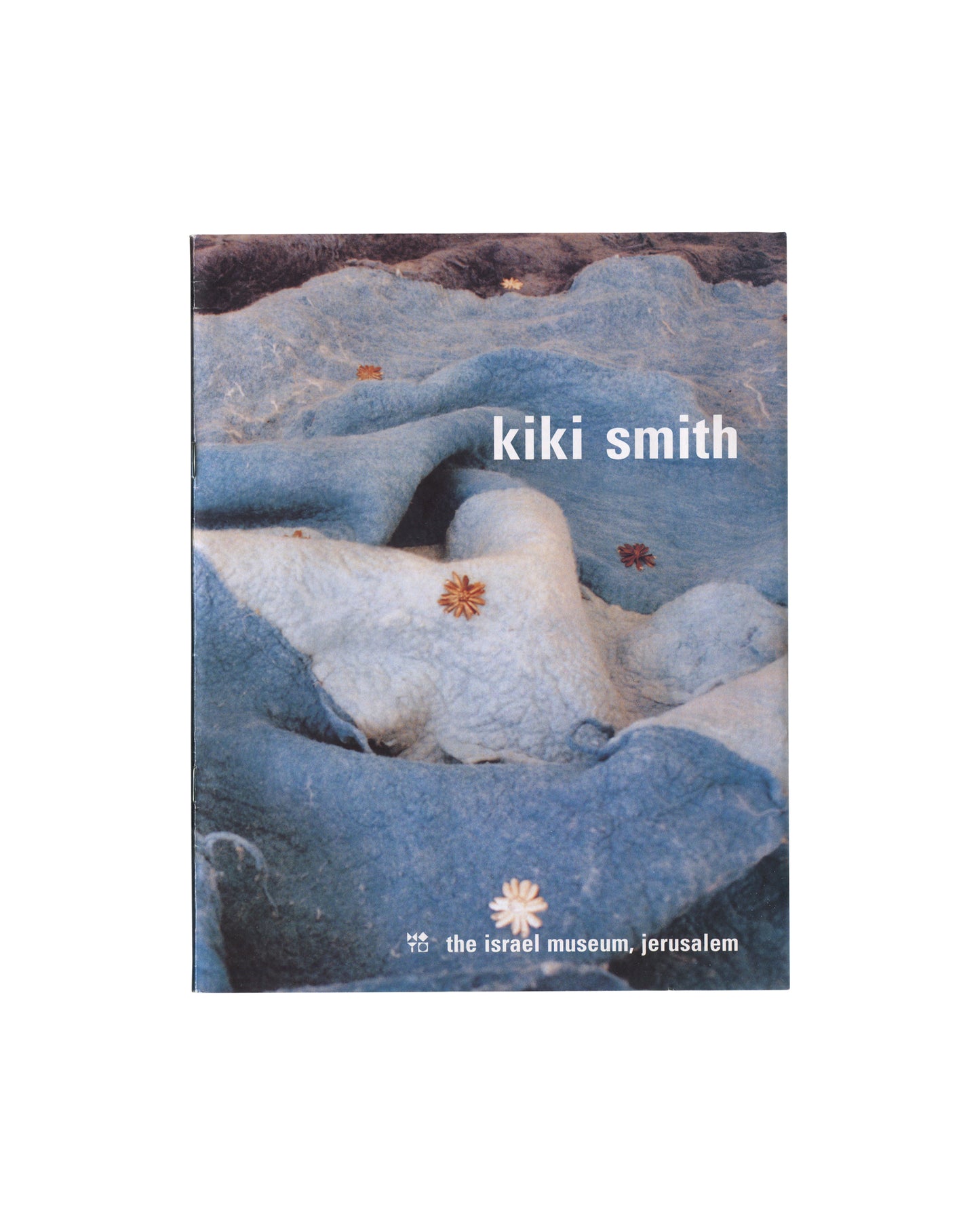 Kiki Smith, The Israel Museum Jerusalem 1994, front cover: colour photo of Mother's Coat, blue felt figure with dried flowers, white title type
