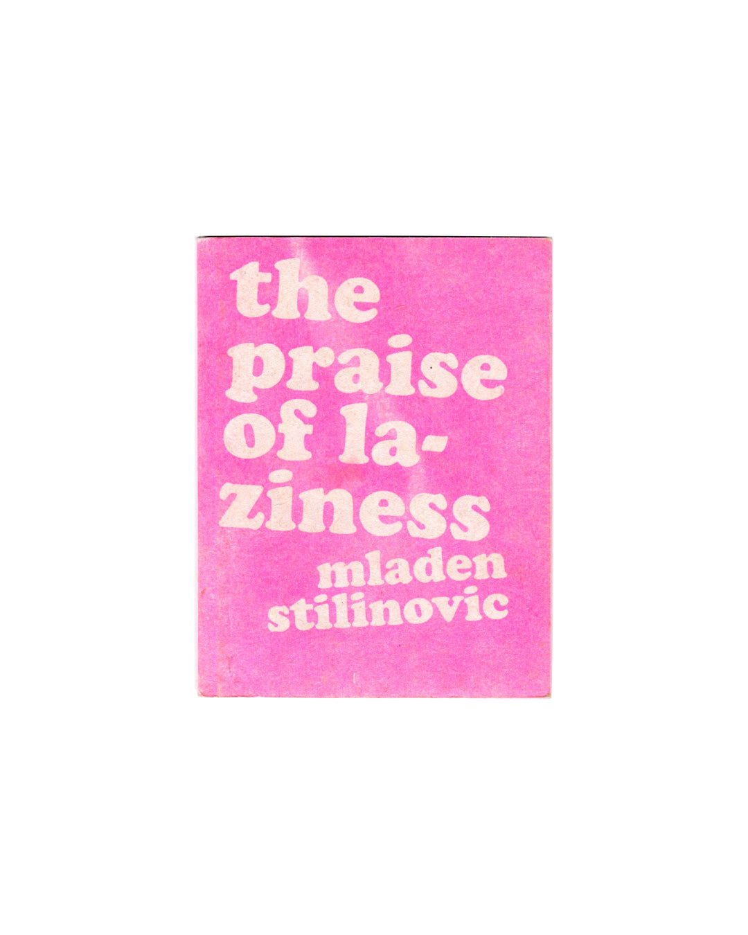 Cover of Mladen Stilinović, The Praise of Laziness, Gato Negro, Mexico City, 2015, showing the title in large pale pink rounded serif type on a vivid magenta risograph-printed wrapper, with the author name mladen stilinovic below in smaller type.