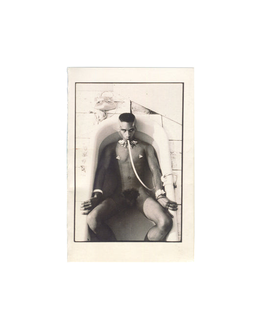 Sur Rodney (Sur), Selected Poetry, New York 2010, front cover: b&w photo by Donald Lawrence Herron — muscular figure seated, open jacket, tube at mouth, geometric backdrop

