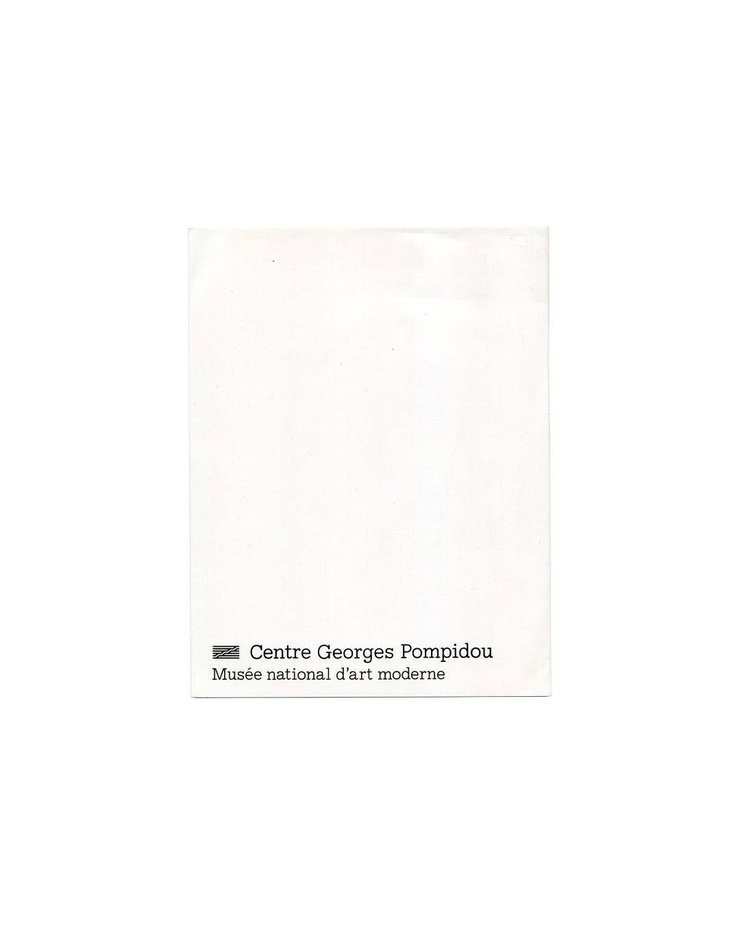 Reverse of 1984 Alibis Centre Georges Pompidou exhibition invitation card, folded, showing plain white card stock with Centre Georges Pompidou / Musée national d'art moderne logotype and wordmark in small black sans-serif type at lower left, against white ground.