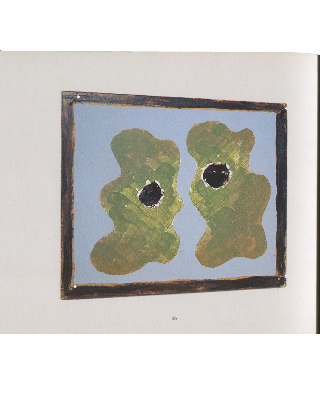 Interior page 46 from Richard Tuttle, Warm Brown, 1–67 and Mesa Pieces, Kärntner Landesgalerie, c. 1990s, showing a colour reproduction of an untitled Mesa Pieces work comprising a rectangular board painted pale blue with a dark brown painted border, on which two organic green amoeba-like forms each containing a dark circular void are mounted, pinned to a white wall.