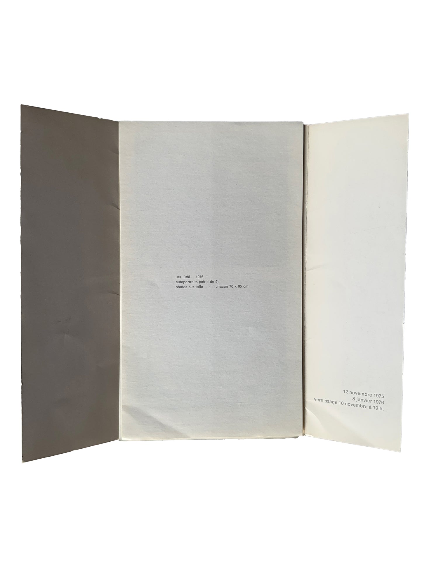 Urs Lüthi exhibition invitation open trifold, Galerie Isy Brachot, Brussels, 1975 — interior showing white card insert with caption: "autoportraits (série de 8), photos sur toile, chacun 70 x 95 cm", 1976, vernissage 10 novembre 1975