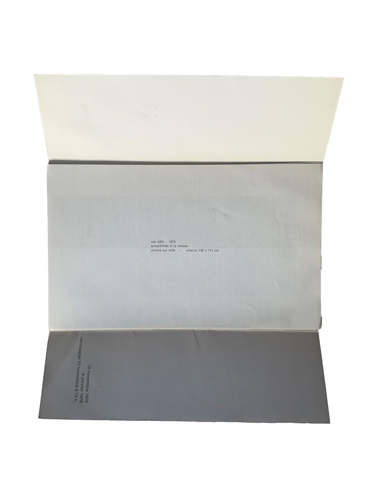 Urs Lüthi exhibition invitation open bifold, Galerie Isy Brachot, Brussels, 1975 — interior showing grey card insert with caption: "autoportrait à la chaise, photos sur toiles, chacun 138 x 111 cm", 1975