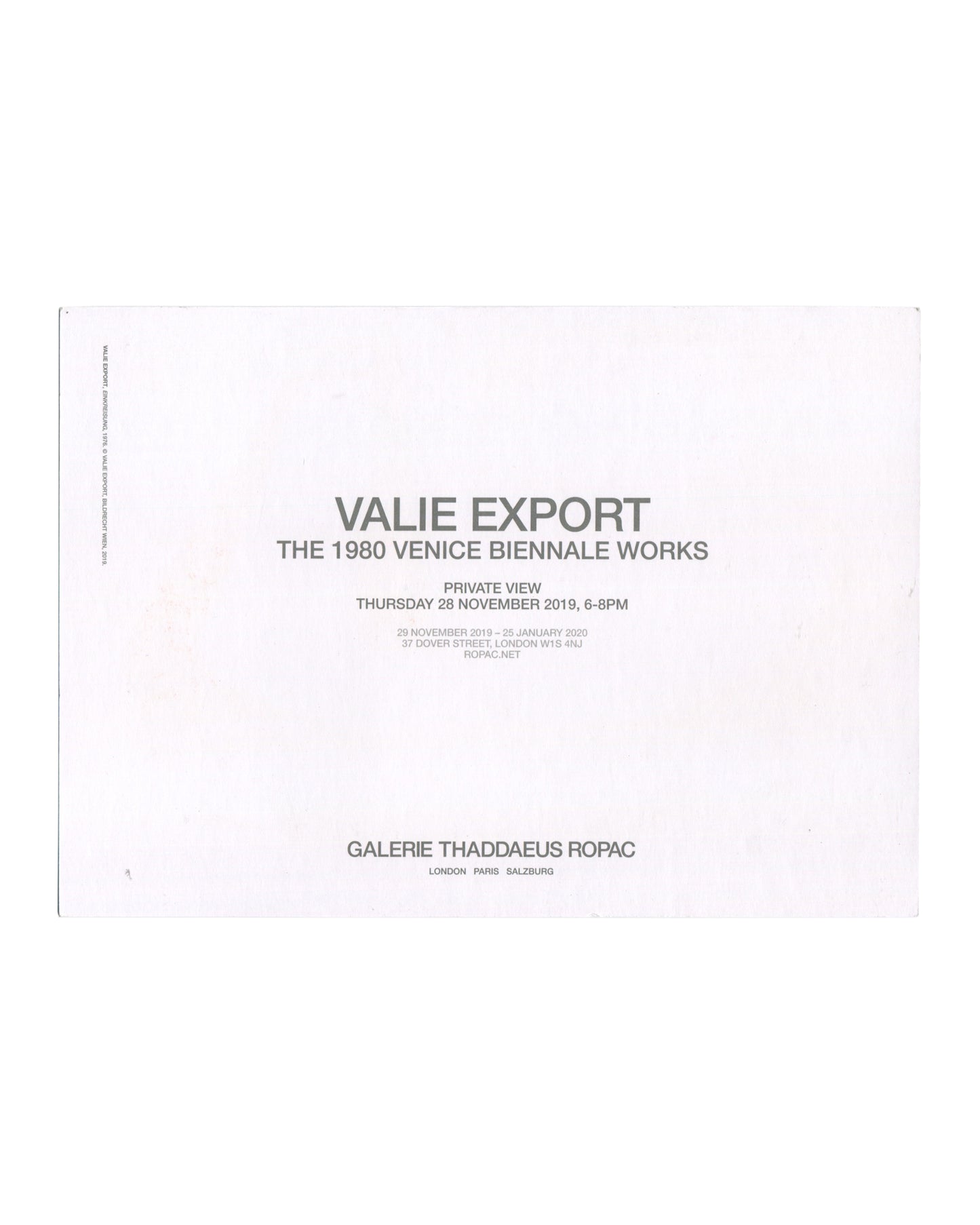 Reverse of 2019 VALIE EXPORT Thaddaeus Ropac invitation card showing white ground with grey sans-serif type reading 'VALIE EXPORT / THE 1980 VENICE BIENNALE WORKS' in large bold type, 'PRIVATE VIEW / THURSDAY 28 NOVEMBER 2019, 6–8PM' below, followed by exhibition dates '29 NOVEMBER 2019 – 25 JANUARY 2020', gallery address '37 DOVER STREET, LONDON W1S 4NJ', and 'ROPAC.NET', with 'GALERIE THADDAEUS ROPAC / LONDON PARIS SALZBURG' in bold at foot.