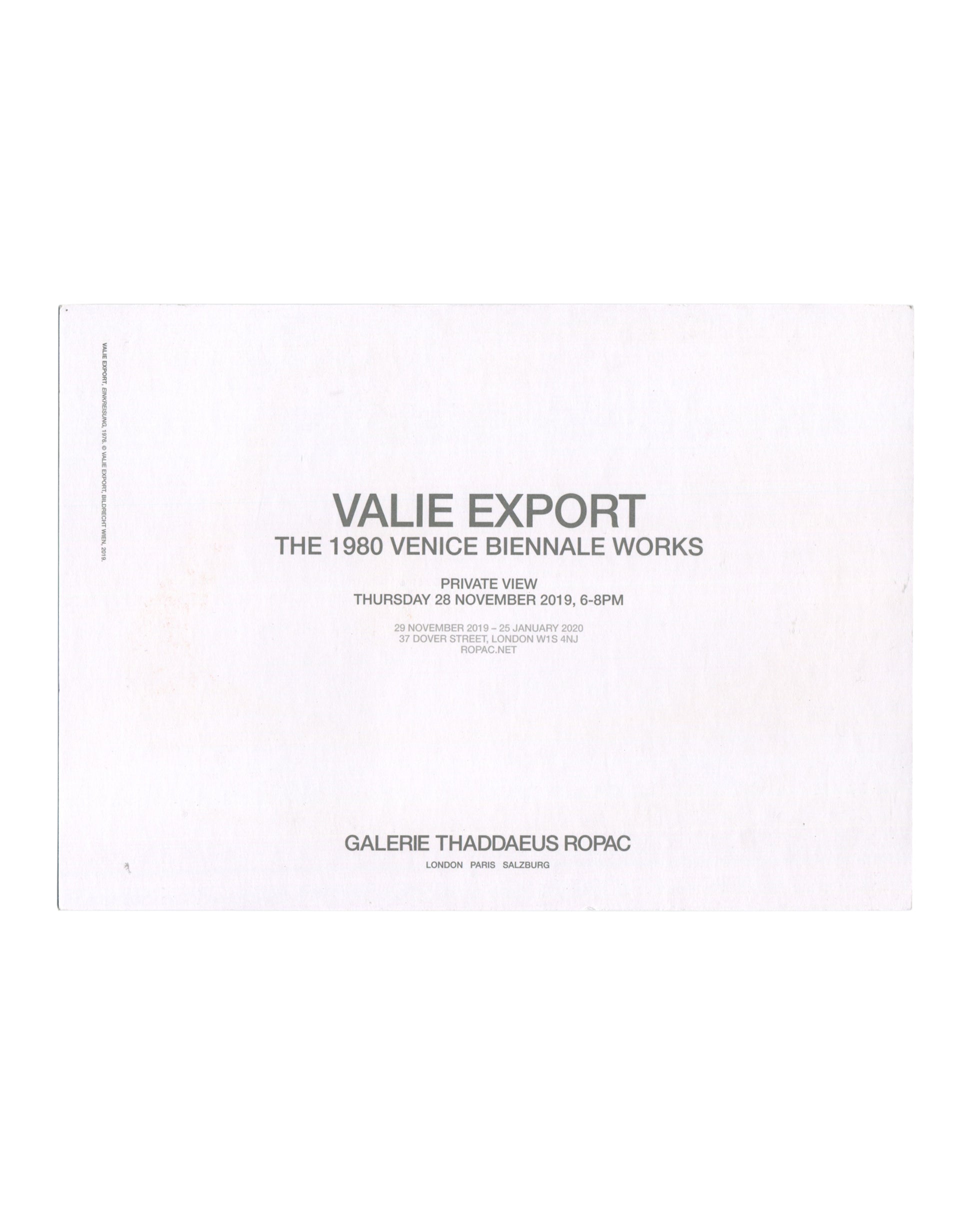 Reverse of 2019 VALIE EXPORT Thaddaeus Ropac invitation card showing white ground with grey sans-serif type reading 'VALIE EXPORT / THE 1980 VENICE BIENNALE WORKS' in large bold type, 'PRIVATE VIEW / THURSDAY 28 NOVEMBER 2019, 6–8PM' below, followed by exhibition dates '29 NOVEMBER 2019 – 25 JANUARY 2020', gallery address '37 DOVER STREET, LONDON W1S 4NJ', and 'ROPAC.NET', with 'GALERIE THADDAEUS ROPAC / LONDON PARIS SALZBURG' in bold at foot.