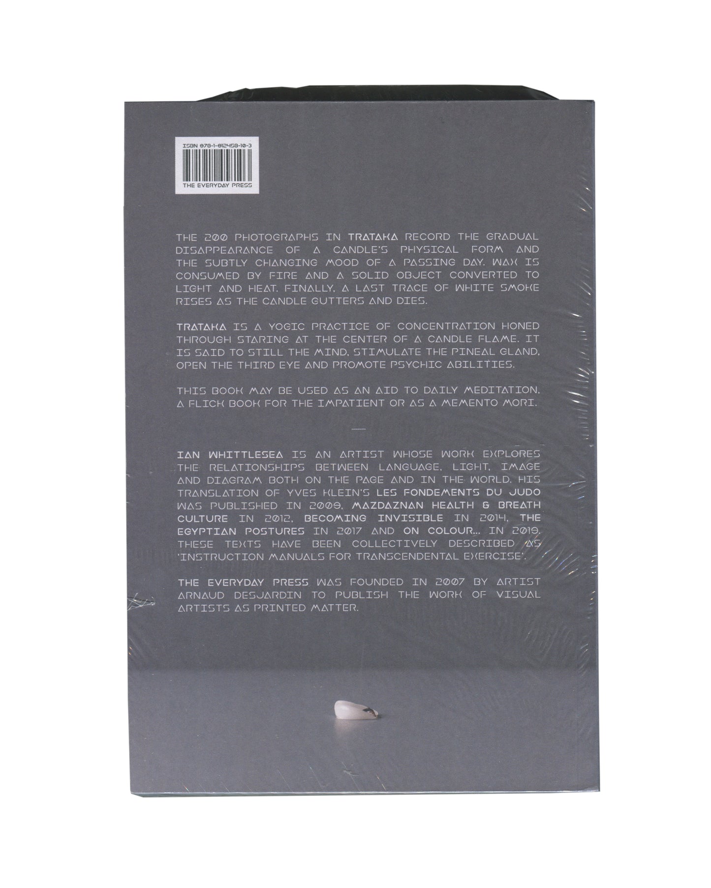 Ian Whittlesea, Trataka, The Everyday Press 2020, back cover: grey ground, white all-caps text describing the work and artist; ISBN barcode upper left; shrinkwrap visible
