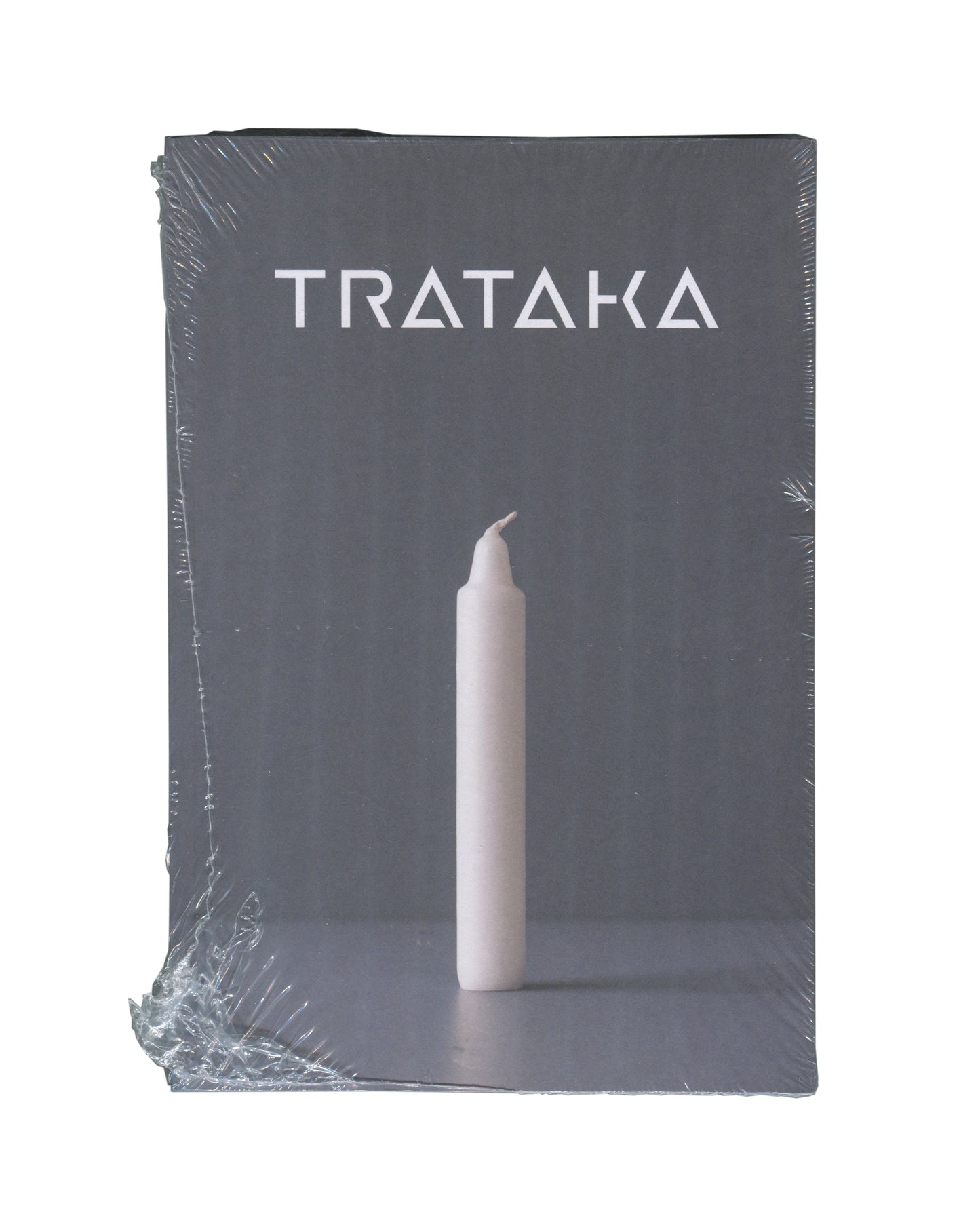 Ian Whittlesea, Trataka, The Everyday Press 2020, front cover: grey ground, white sans-serif title above single white candle on shelf, sealed in clear shrinkwrap