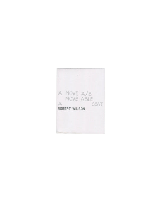 Exhibition poster, Robert Wilson, A Move A/B / Move Able à Seat, Galerie de France, Paris, 2002. Printed paper, 29.5 × 40 cm unfolded, folded twice. Front cover: minimal white ground, grey text reading ‘A MOVE A/B / MOVE ABLE / A SEAT’ and ‘ROBERT WILSON’ in light grey. Good vintage condition with original folds and handling marks.