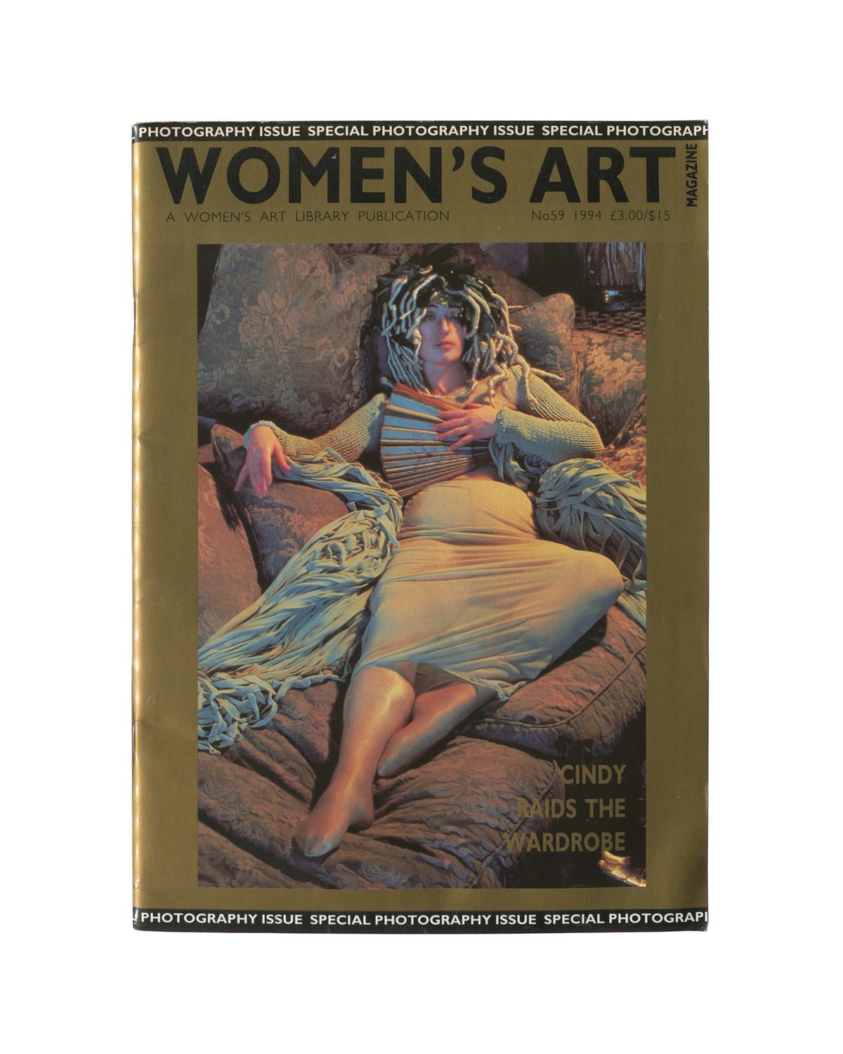 Magazine, Women's Art Magazine, No. 59, Women's Art Library, London, 1994. Special Photography Issue. Staple-bound magazine with gold-toned cover featuring a photograph of a woman in costume reclining — Cindy Sherman. Text reads: Women's Art Magazine, A Women's Art Library Publication, No59 1994, £3.00/£15. Banner top and bottom: Photography Issue Special Photography Issue Special Photography. Cover text: Cindy Raids the Wardrobe.