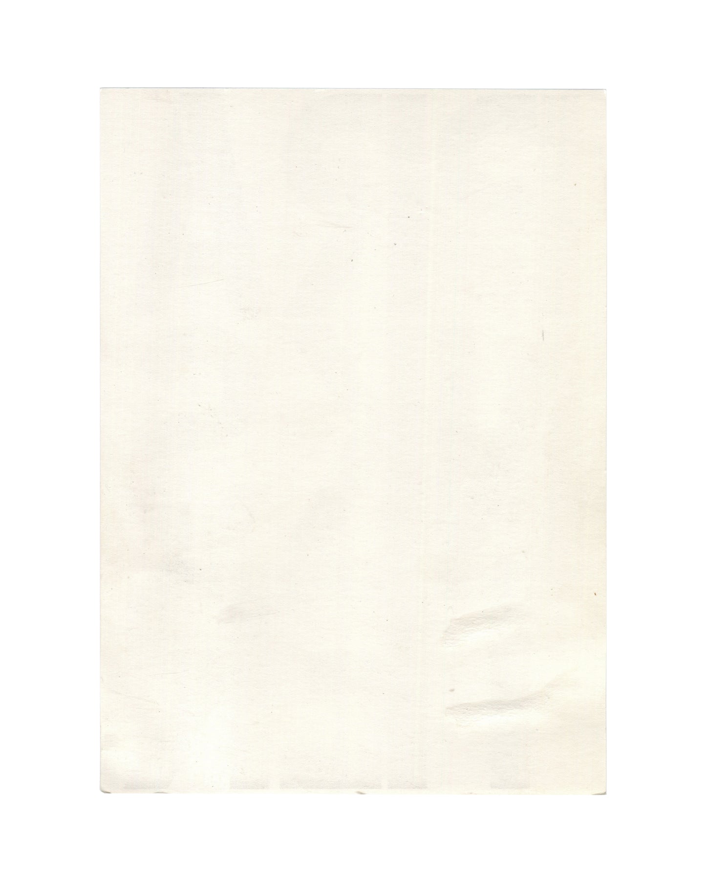 Reverse of c. late 1980s–early 1990s Christopher Wool Prankster graphic card showing plain cream-white card stock, blank, with light age toning, soft surface marks, minor creasing, and faint discoloration consistent with period printed ephemera and archive storage.
