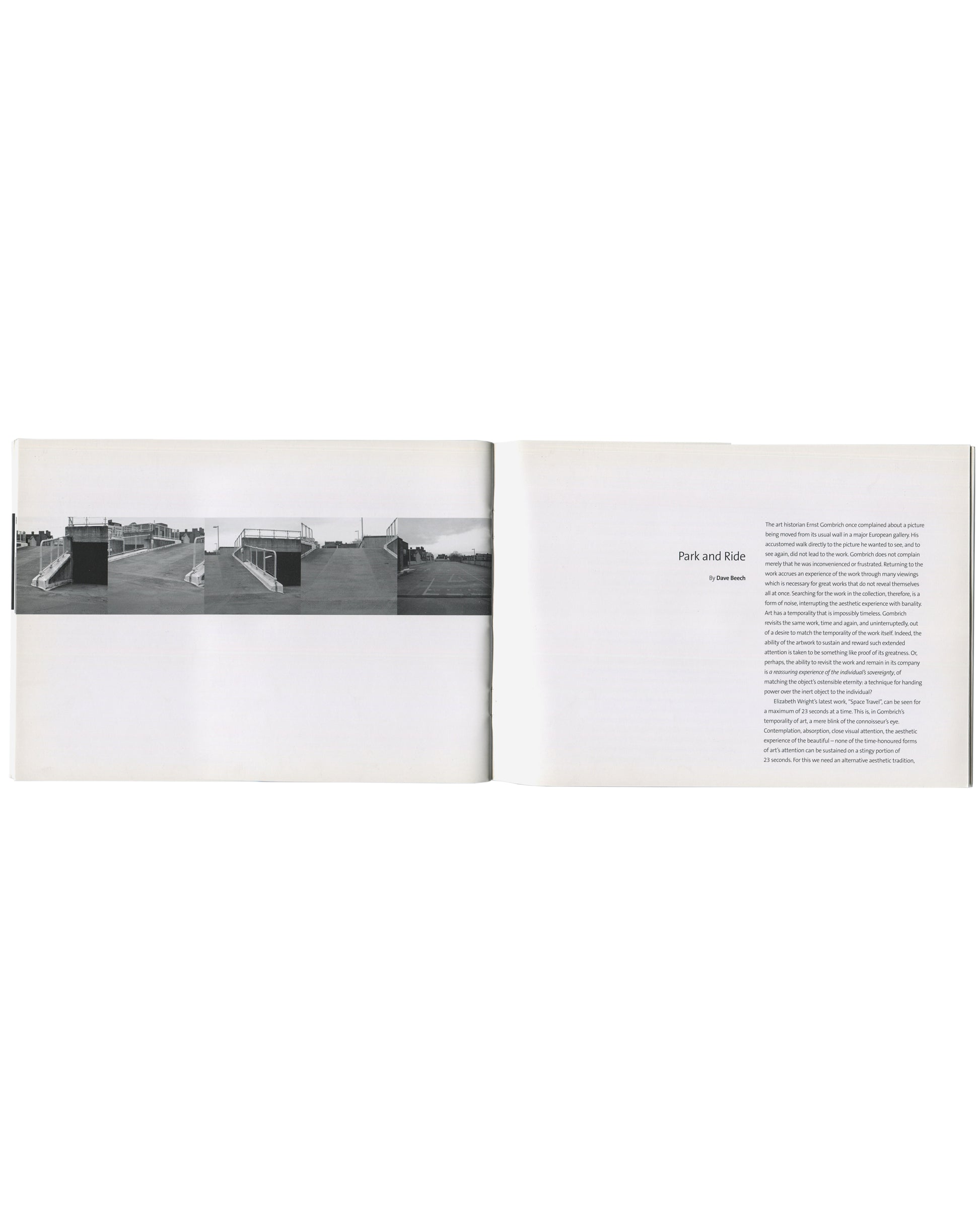 Interior spread, Elizabeth Wright, Space Travel, 2005. Left page: horizontal black-and-white panoramic photograph of a rooftop car park — concrete ramp, metal railings, open sky, and a white rabbit or hare visible on the surface. Right page: essay text in small serif type, headed 'Park and Ride / by Dave Beech', set in two columns with wide white margins above and below. Gutter visible at centre.