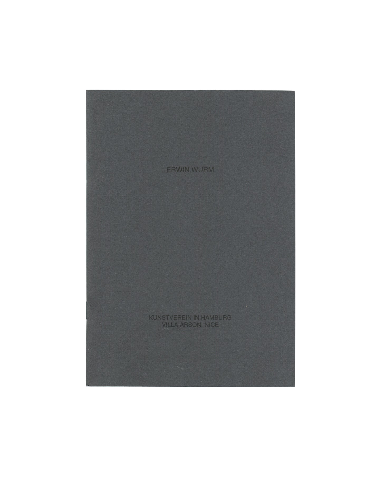Cover of Erwin Wurm, Kunstverein in Hamburg / Villa Arson, Nice, 1993, showing a plain dark grey-green softcover with ERWIN WURM in small debossed type at centre and KUNSTVEREIN IN HAMBURG / VILLA ARSON NICE in small debossed type at lower left.