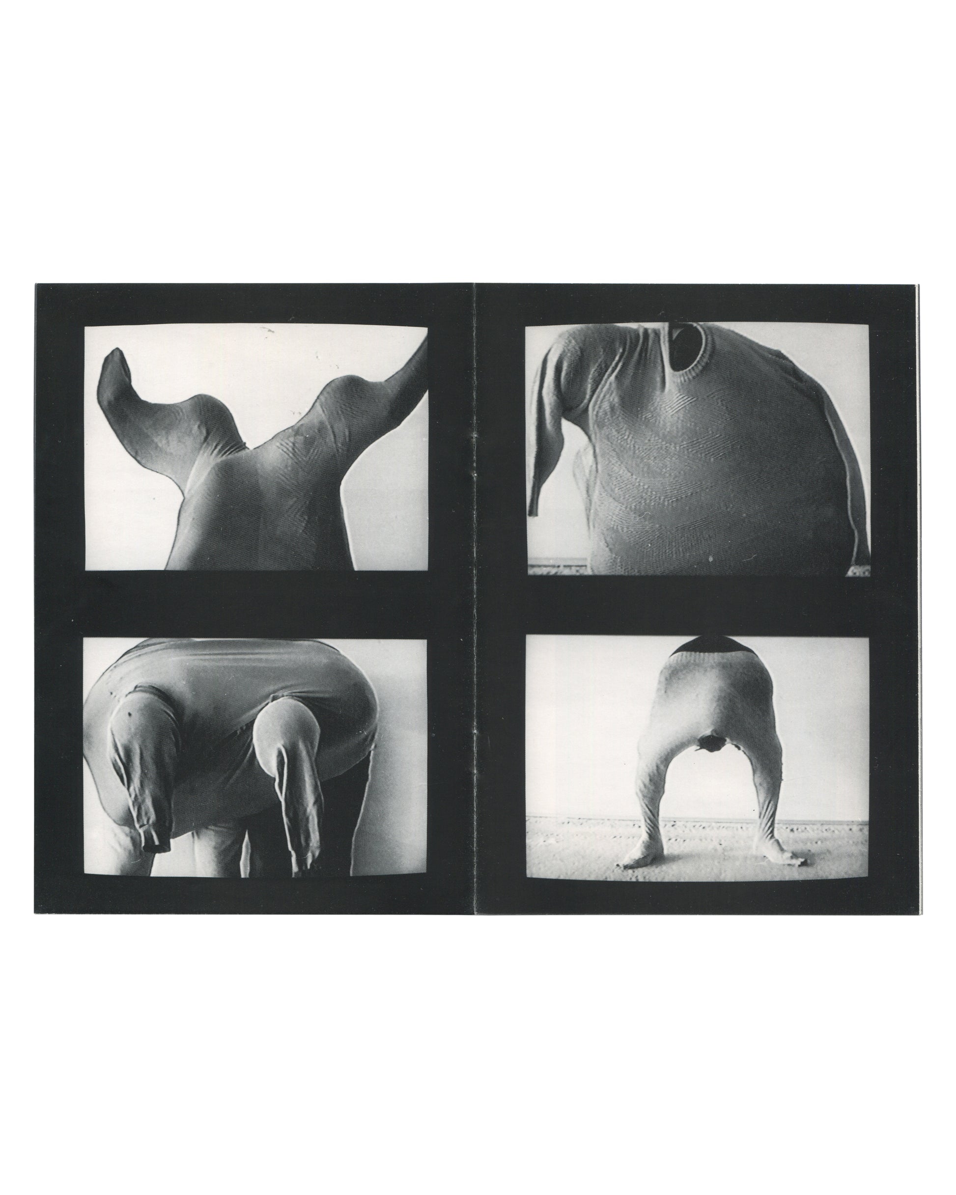 Interior spread of Erwin Wurm, Kunstverein in Hamburg / Villa Arson, 1993, showing four black-and-white photographs arranged in a two-by-two grid on a black ground, each depicting a figure whose head and upper body are entirely concealed within an oversized knitted sweater, the body contorted into abstract sculptural forms.