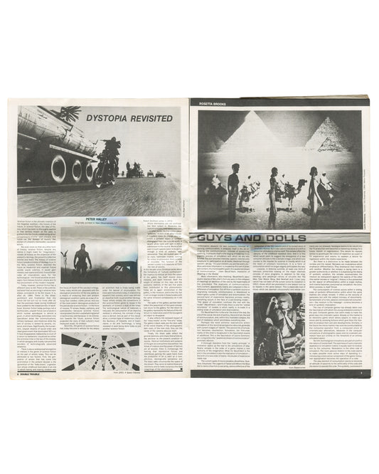 Interior spread, ZG No. 11 / Art & Text 15: Double Trouble, 1984. Pages 6–7. Left: 'DYSTOPIA REVISITED' — essay by Peter Halley with black-and-white film stills including motorcycles, futuristic vehicles, and armoured figure. Right: 'ROSETTA BROOKS' header; black-and-white photograph of figures in white robes before pyramids and sphinx; below: 'GUYS AND DOLLS' essay with black-and-white performance photograph. Dense two-column text throughout.
