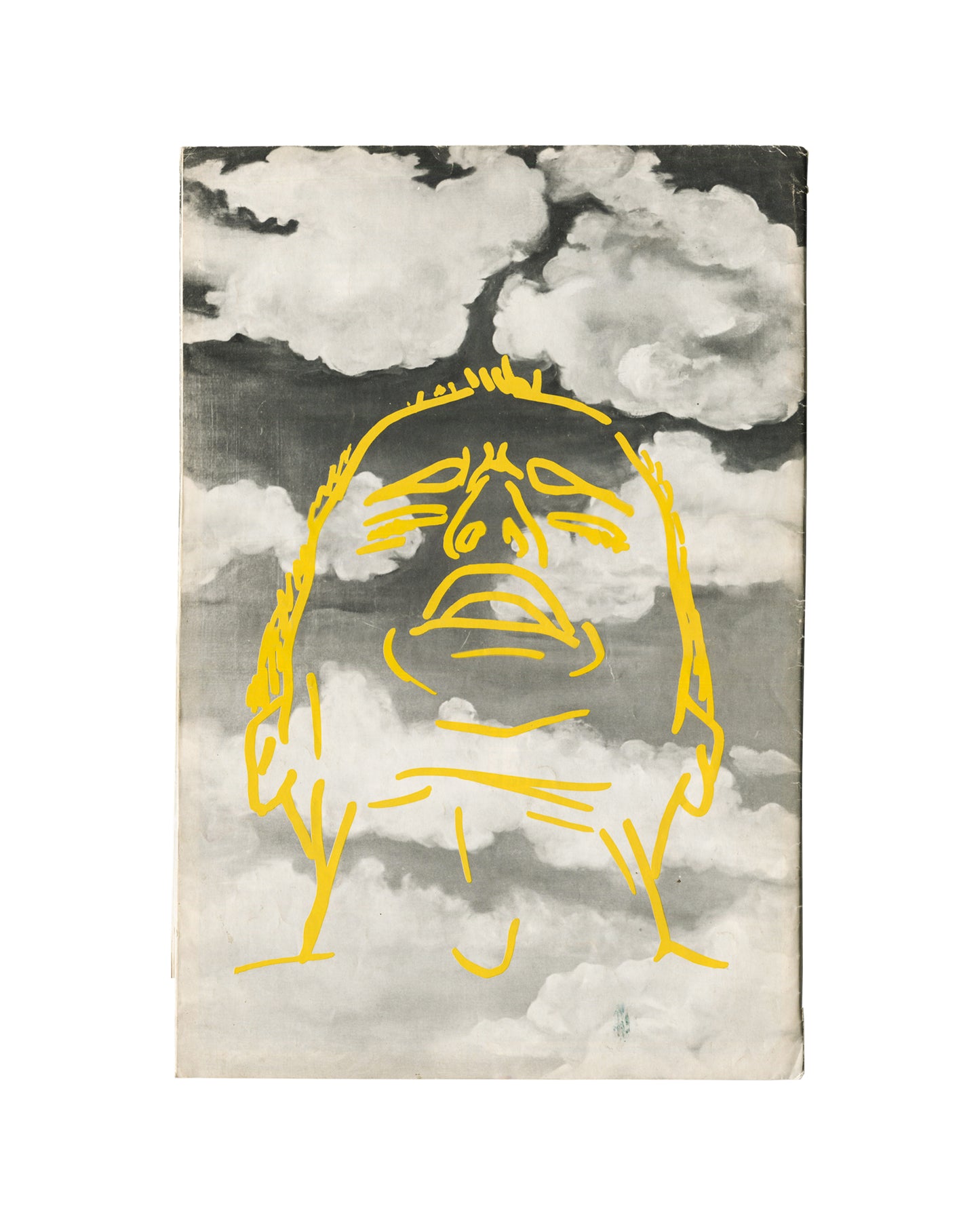Back cover, ZG Magazine No. 13: Political Fictions, edited by Rosetta Brooks, Spring 1985. Black-and-white photographic ground — dramatic cloudscape, grey sky. Yellow line-drawn face overlaid — same distressed figure as front cover, rendered in yellow marker-style lines; open mouth, heavy-lidded eyes, long hair. Small blue ZG logotype lower centre. Cover art by Nancy Dwyer. Handling wear and age toning consistent with large-format periodical of this period.
